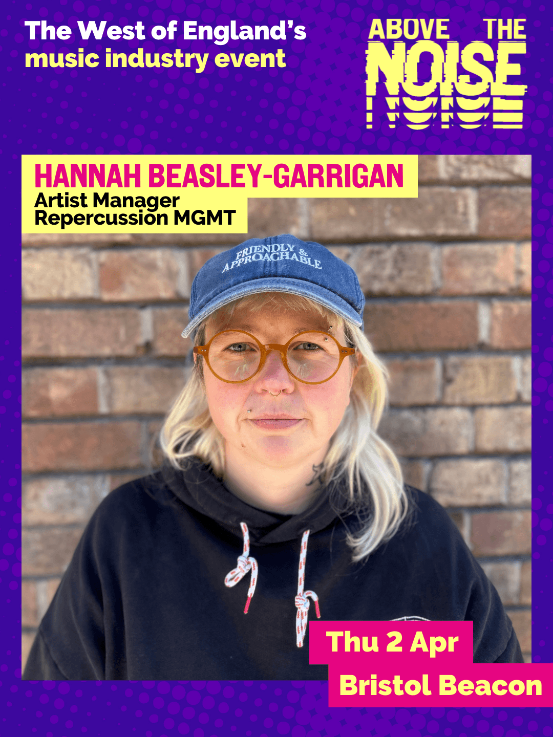 Hannah Beasley-Garrigan - Artist Manager, Repercussion MGMT. Thu 2 Apr, Bristol Beacon. A person with long blonde hair wearing a blue denim cap and a black hoodie poses in front of a brick wall.