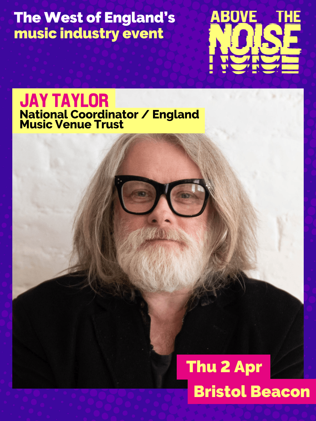 Jay Taylor - National Coordinator / England, Music Venue Trust. Thu 2 Apr, Bristol Beacon. A person with long grey hair, a beard, and black thick-rimmed glasses poses in front of a marbled white wall.