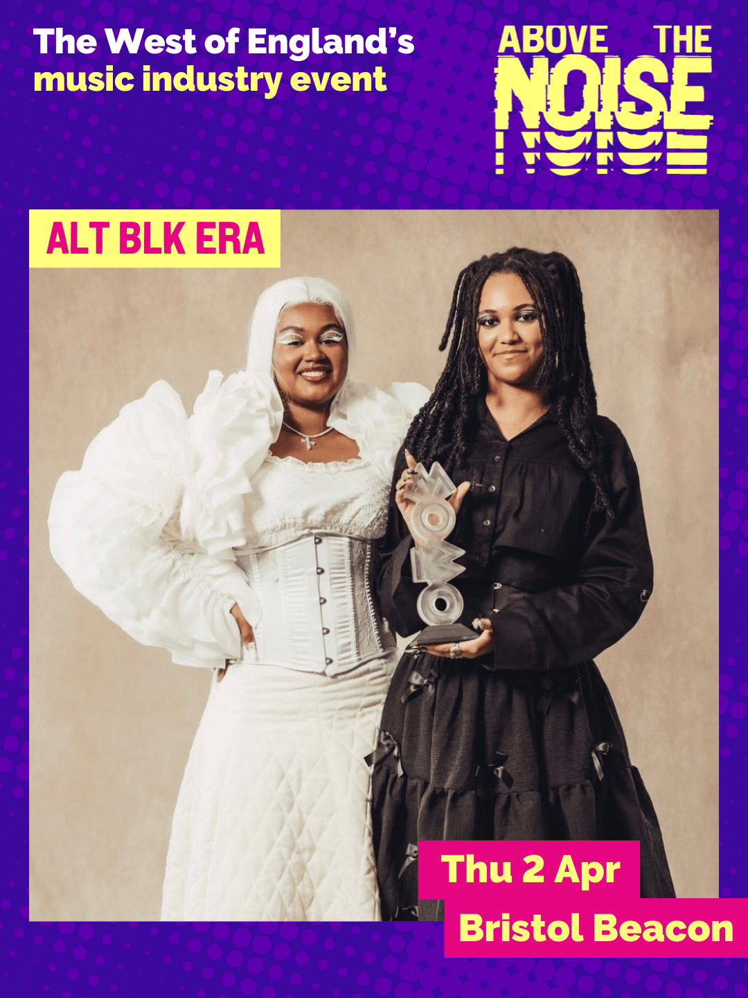 ALT BLK ERA. Thu 2 Apr, Bristol Beacon. Two people wearing formal gowns - one dressed entirely in white, the other in black, pose with happy expressions holding an award in the shape of 