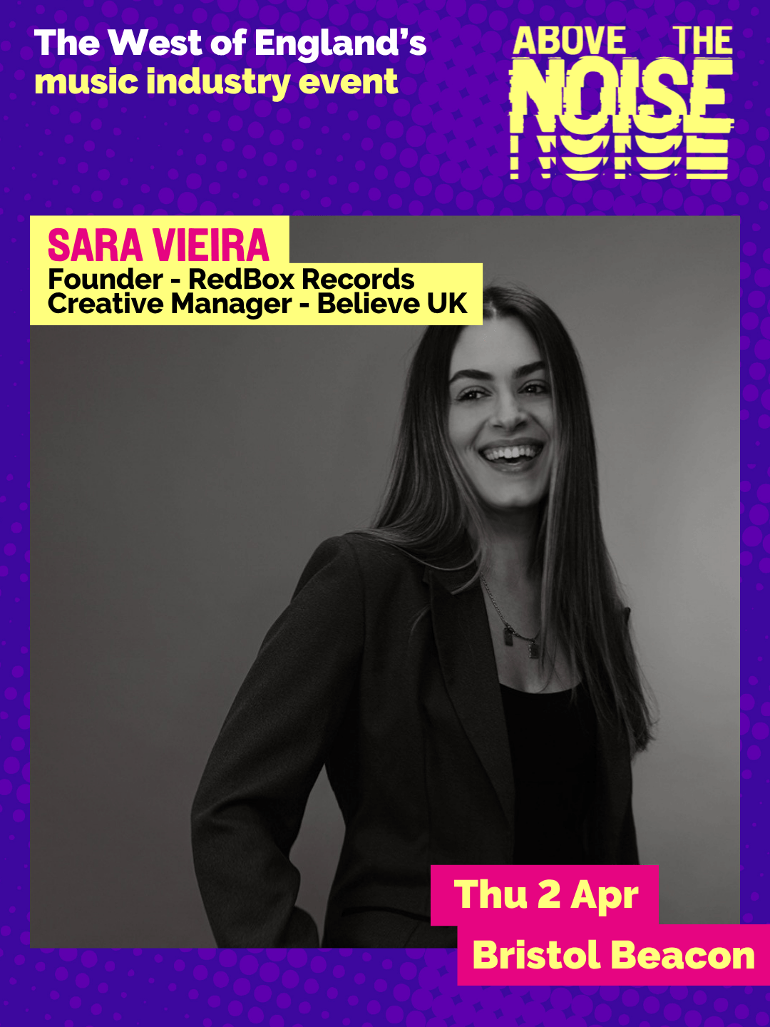 Sara Vieira - Founder, RedBox Records, Creative Manager, Believe UK. Thu 2 Apr, Bristol Beacon. A black and white photo of a smiling person with long dark hair wearing a suit jacket posing in front of a grey backdrop.