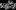 A black and white digital image of a glitchy style font reading 