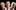 A person with grey hair, wearing a suit and looking sternly at the camera. To each side of them there are two more people who have there faces blurred out.